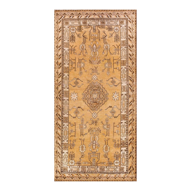 1900s Tan Camel Medallion Antique Khotan East Turkestan Rug 4'4" X 8'9" Handknotted Wool Carpet For Sale