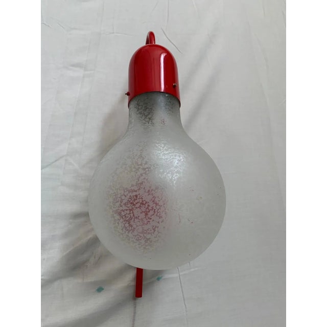 Set of 2 wall sconces Stilux Milan 60s model Atlantic. Red enameled metal body. Important and beautiful the glass bowl,...