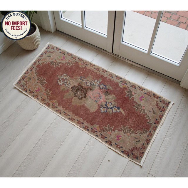 This exquisite hand-knotted Oushak rug features a soft, muted color palette that brings a touch of antique elegance to any...