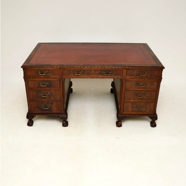 A very impressive and extremely well made antique Chippendale style pedestal desk. This is in the famous Chippendale...
