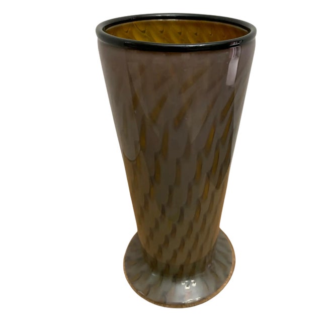 This exquisite mouth-blown glass vase, crafted by skilled artisans at Inferno Glass Shop in 2003, is a striking example of...