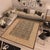 Enhance the ambiance of your home with this magnificent Persian-influenced Turkish hand-knotted rug made by skilled...