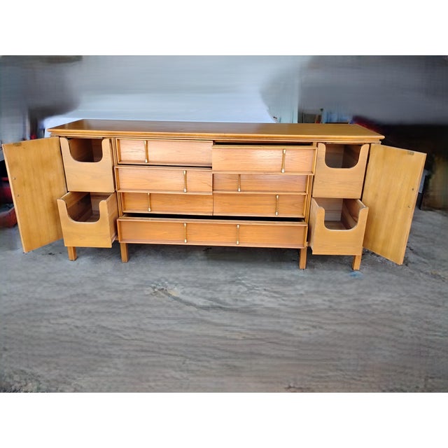 A spectacular Mid Century lowboy dresser or credenza from the Thomasville Furniture Company. This was made during the...