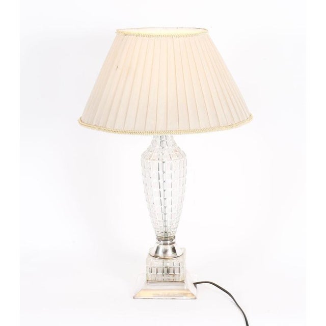 This is an elegant antique Bohemian Art Deco crystal cut glass table lamp, circa 1920 in date. This stylish lamp has a...