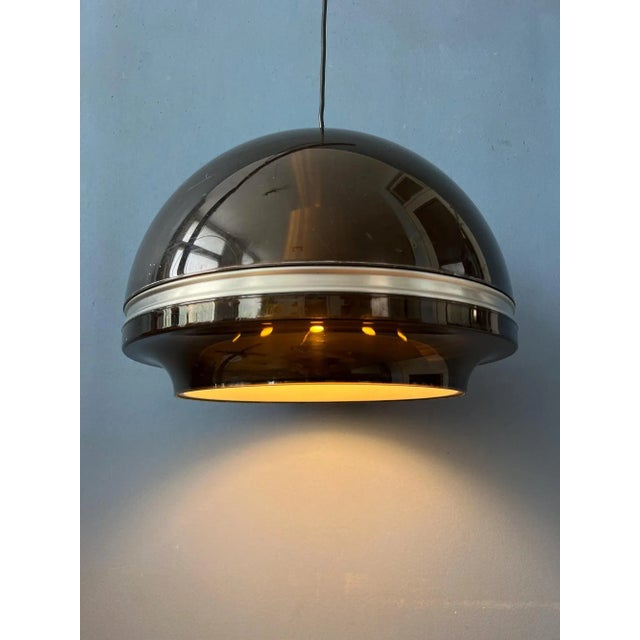 Large space age flying saucer 'Dome' pendant lamp by Dijkstra. The lamp consists of an acrylic glass outer shade and...
