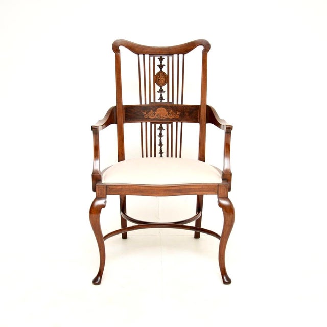 A beautiful and elegant antique Edwardian armchair. This was made in England, it dates from around 1900-1910 period. It is...