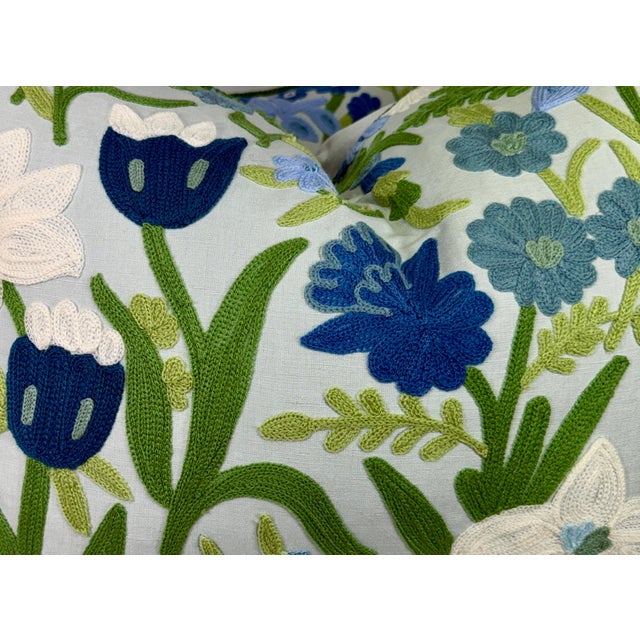 Custom pair of 18"x24" pillows covered in Schumacher "Crewel Garden" in color sky and backed in a solid coordinating...