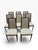 A sophisticated, complete set of eight (8) contemporary high-back dining side chairs. These chairs feature an elegant,...