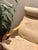 Iconic ikea poäng lounge chair dating from 2005, featuring a warm natural wood frame and a beautifully aged cream leather...