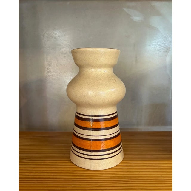 Mid century ceramic vase made in West Germany by Scheurich. Excellent example of the pottery styles at the time. In...