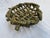 A single vintage pottery woven basket or bowl featuring a Palissy style glaze over a faux bois textured finish.