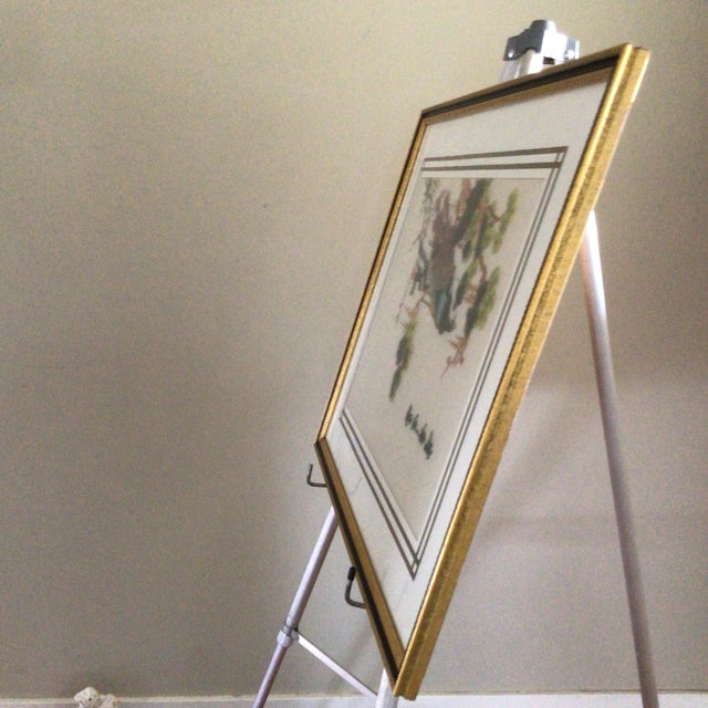 This vintage Asian silk embroidered panel features peacocks perched in a pine tree surrounded by flowers. From a private...