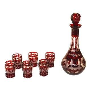 Early 20th Century Bohemian Decanter 6 Liquor Tumblers Red Glass Hand Wheel Engraved Czech For Sale