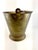 Vintage brass cachepot featuring a classic tapered bucket form, rolled foot, and decorative swing handle. Crafted in solid...