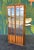 Timeless classic in this hutch. Walnut veneers and arched panels to accent the illuminated case and display your prized...
