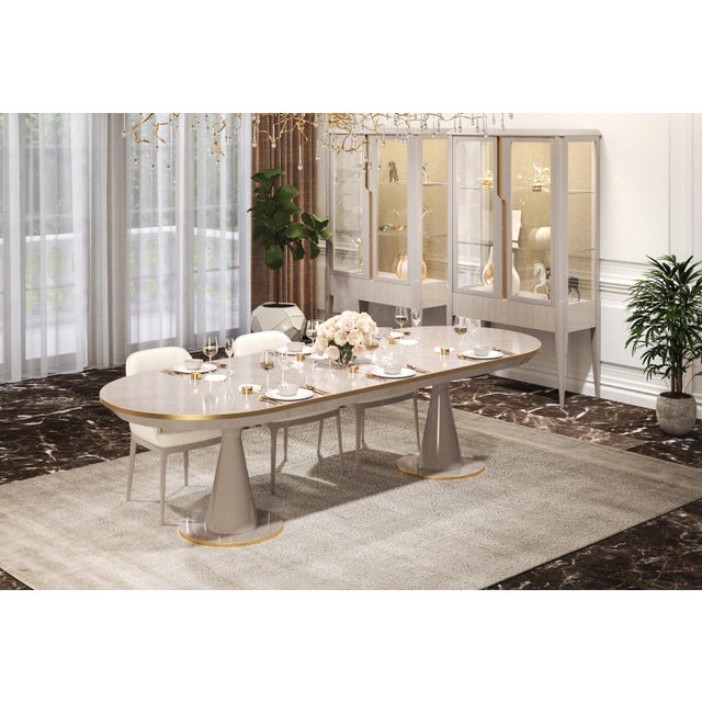 The Verona Oval Dining Table is handcrafted in Italy and designed with a clean, modern look. The tabletop features a...