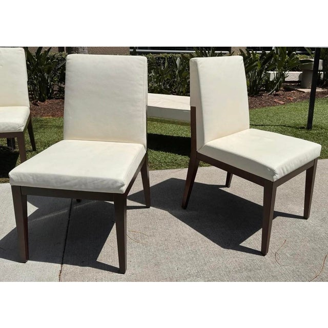 Mid Century Modern Dining Chairs Upholstered in White Leather, Set of 8.