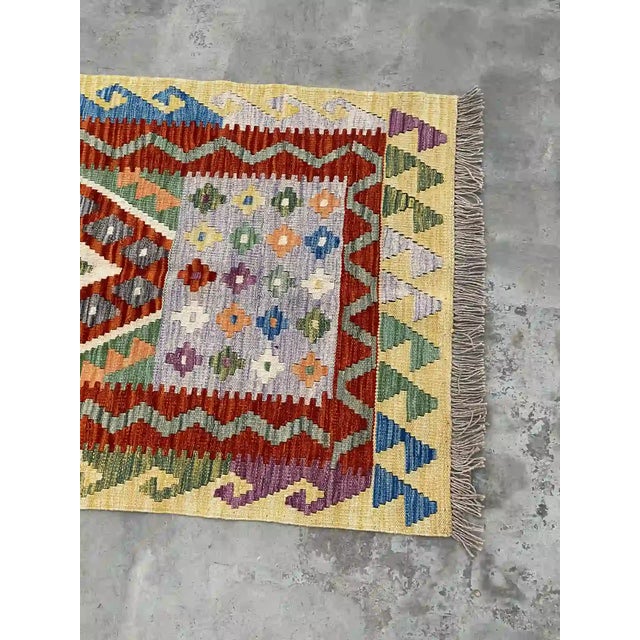Vibrant Hand-Woven Kilim Runner Rug With Geometric Patterns For Sale - Image 4 of 10