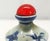 Chinese blue-and-white hard-paste porcelain snuff bottle with red glass stopper, late Qing/Republic period, circa...
