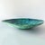 Mid 20th Century circa late 1970s oversized ceramic decorative bowl/dish. Glazed in jewel tones of blue and green. Hand-...