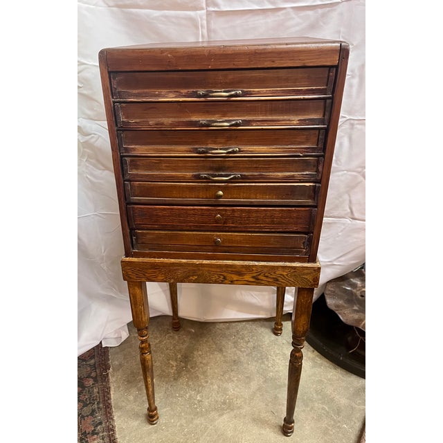 Antique German haberdashery thread cabinet. Gutermann was a brand known for silk thread "Seda para coser". The logo is...
