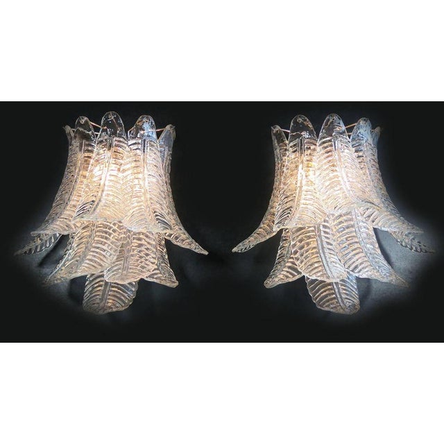 Fantastic pair of vintage Murano wall sconce made by ten Murano transparent six-tier felci for each applique in a chrome...