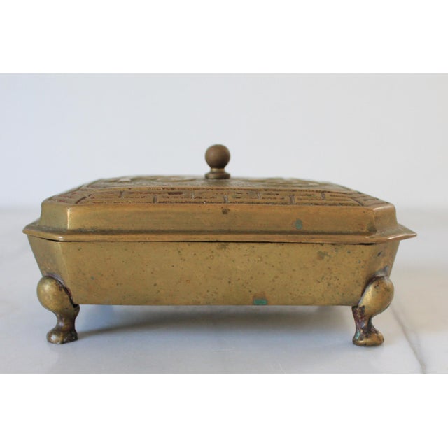 Vintage solid brass footed Fu Shou Chinese symbol trinket box. No makers mark. Minor age wear. Patina.