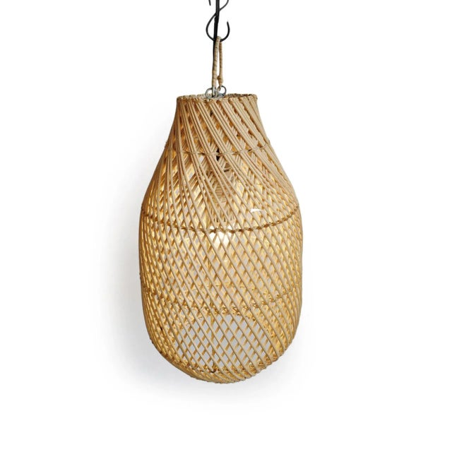 Classic natural raw rattan bottle shaped pendant made from handcrafted traditional weaving techniques with iron wire...