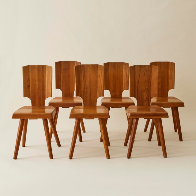 The "S28" dining chairs, designed by Pierre Chapo in 1972, represent a clear transition from mid-century to modernist...