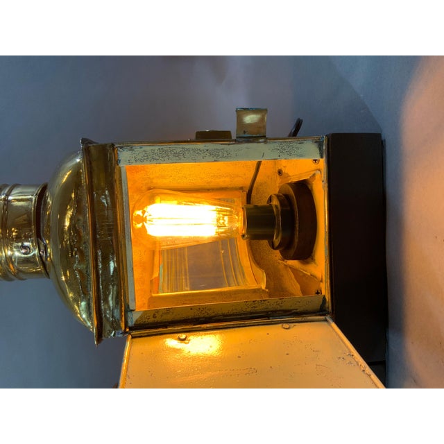 Highly polished and lacquered solid brass ships lantern with clear glass lenses. Lacking colored red and green filters....