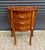 Elegant and practical, this French demi-lune side table is crafted from durable solid wood and showcases beautiful floral...