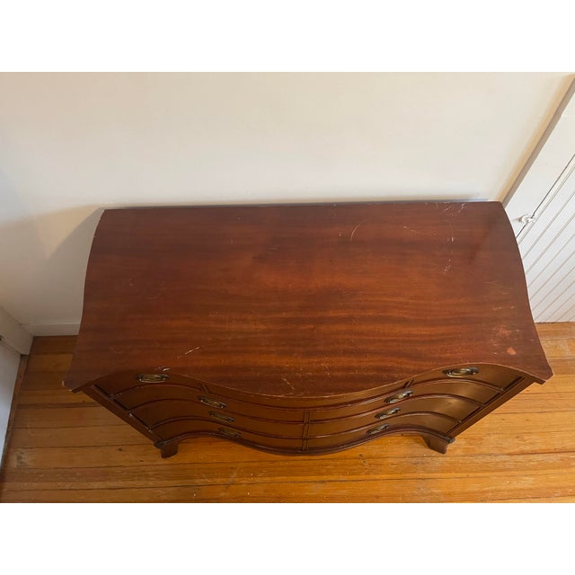 Gorgeous circa 1940s solid mahogany serpentine federal style chest of drawers by White Furniture Company. In good...