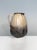 Handcrafted jug from a German studio ceramics workshop of the 1970s, featuring a naturally flowing beige-brown lava glaze...