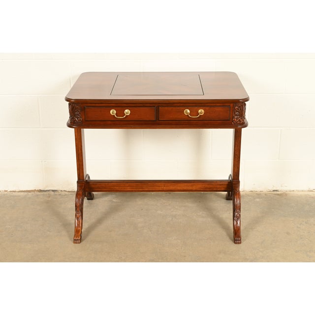 An outstanding American Empire or Regency style game table, tea table, or occasional table In the manner of Baker...