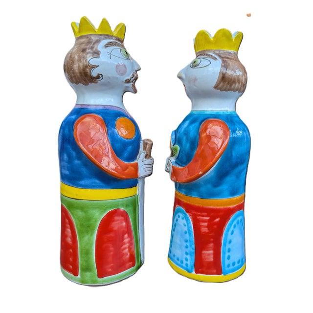 These adorable striking Desimone Candle Holders with bold colors in a ceramic will brighten up any home. They are both...