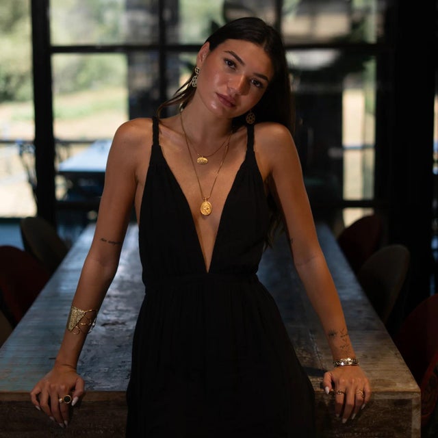 Embrace the strength, wisdom, and spirit of a divine warrior with the Golden Warrior Goddess Medallion Necklace. This...