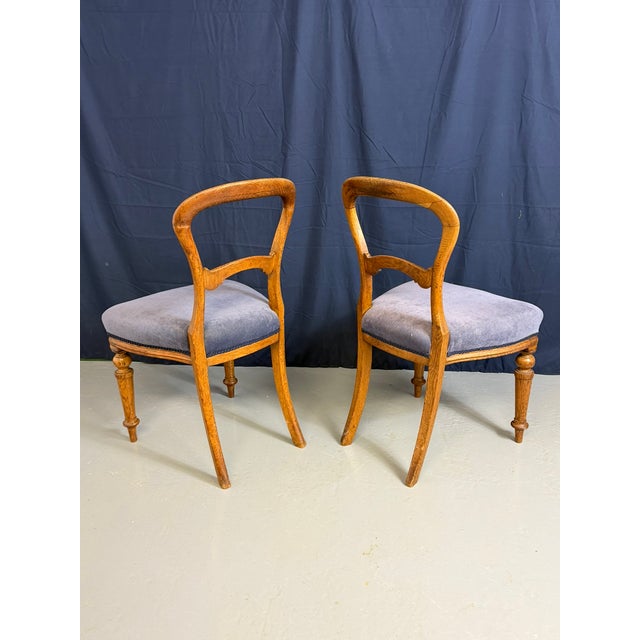 Antique Victorian balloon back chairs dating from the 19th century (circa 1860–1880). Characterized by their distinctive...
