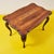 Discover the timeless beauty of this vintage wooden coffee table, a unique piece that embodies the elegance of classic...