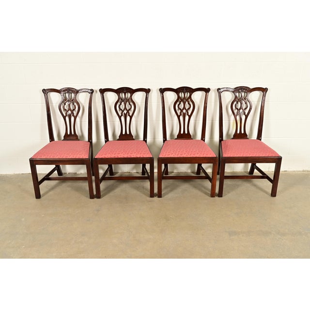 A gorgeous set of four Georgian or Chippendale style dining chairs By Stickley USA, Late 20th Century Carved mahogany...