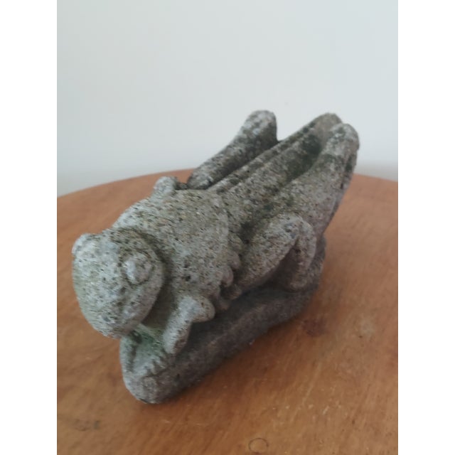 This rare vintage hand carved stone garden sculpture of an Aztec grasshopper is a unique and intricate piece of art that...