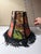 A richly patterned designer lampshade crafted from P. Kaufmann’s “Tiger Eye Basketweave Slate” fabric, featuring a vibrant...