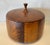 A rare and stunning, modernist design in a solid teak wood ice bucket, maker unknown. Plastic insert keeps wood safe from...