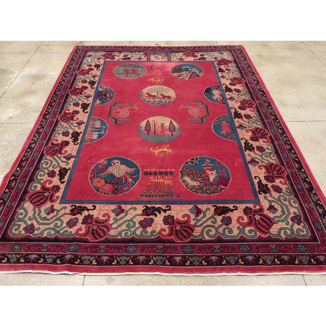 A vintage Chinese pictorial Art Deco room size carpet handmade during the mid-20th century. Measures: 8' 11" x 11' 1"