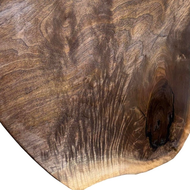 This solid plank hand-planed dining table retains it's natural live edge. Created by a highly skilled craftsman on his...