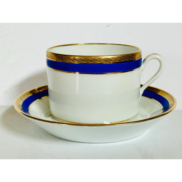 Richard Ginori flat cups with deep saucers in the Palermo Blue pattern. This set includes 11 cups and 10 saucers. Makers...