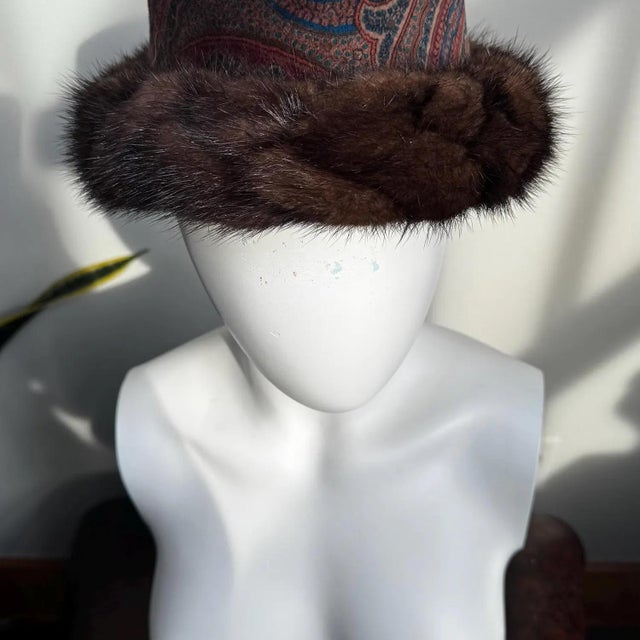 A striking mid-century Lanvin Paris creation blending classic textile artistry with haute craftsmanship. This structured...