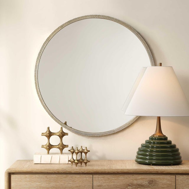 This Elegant Round Mirror Features A Beautifully Crafted Acrylic Facade, Accented With A Warm Champagne Iron Frame....