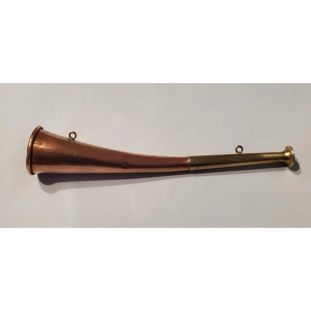 Vintage 10" horn stamped made in England, brass and copper, curved form with rings for carrying chain. Has been tested by...