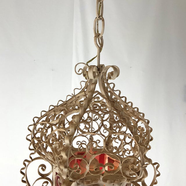 Make a stunning statement with this beautifully detailed vintage-style hanging lantern. Featuring intricate scrollwork...