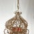 Make a stunning statement with this beautifully detailed vintage-style hanging lantern. Featuring intricate scrollwork...